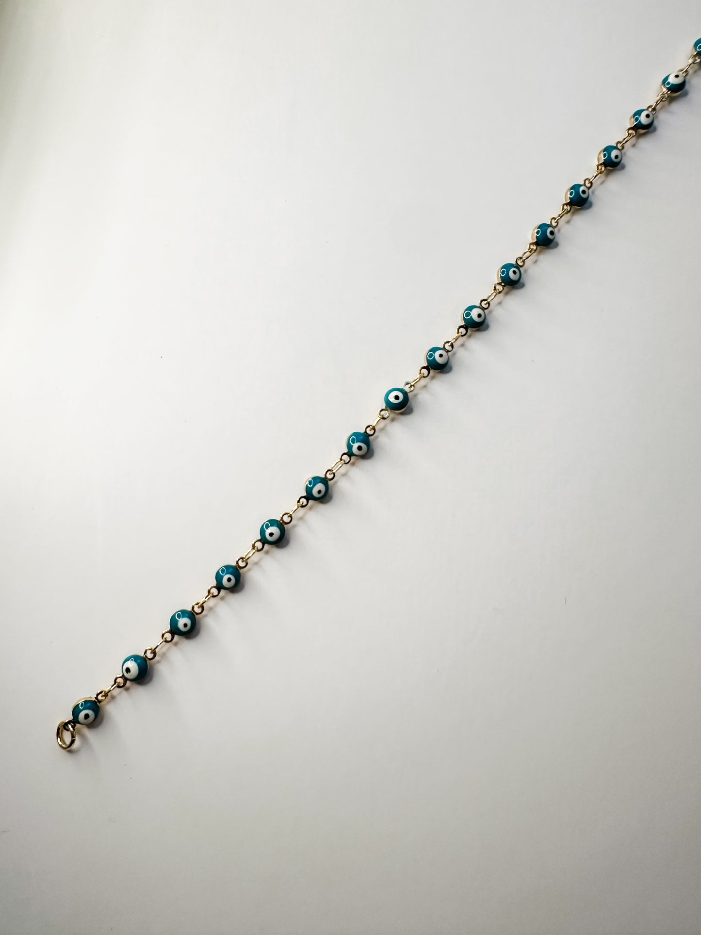 Teal evil eye anklet