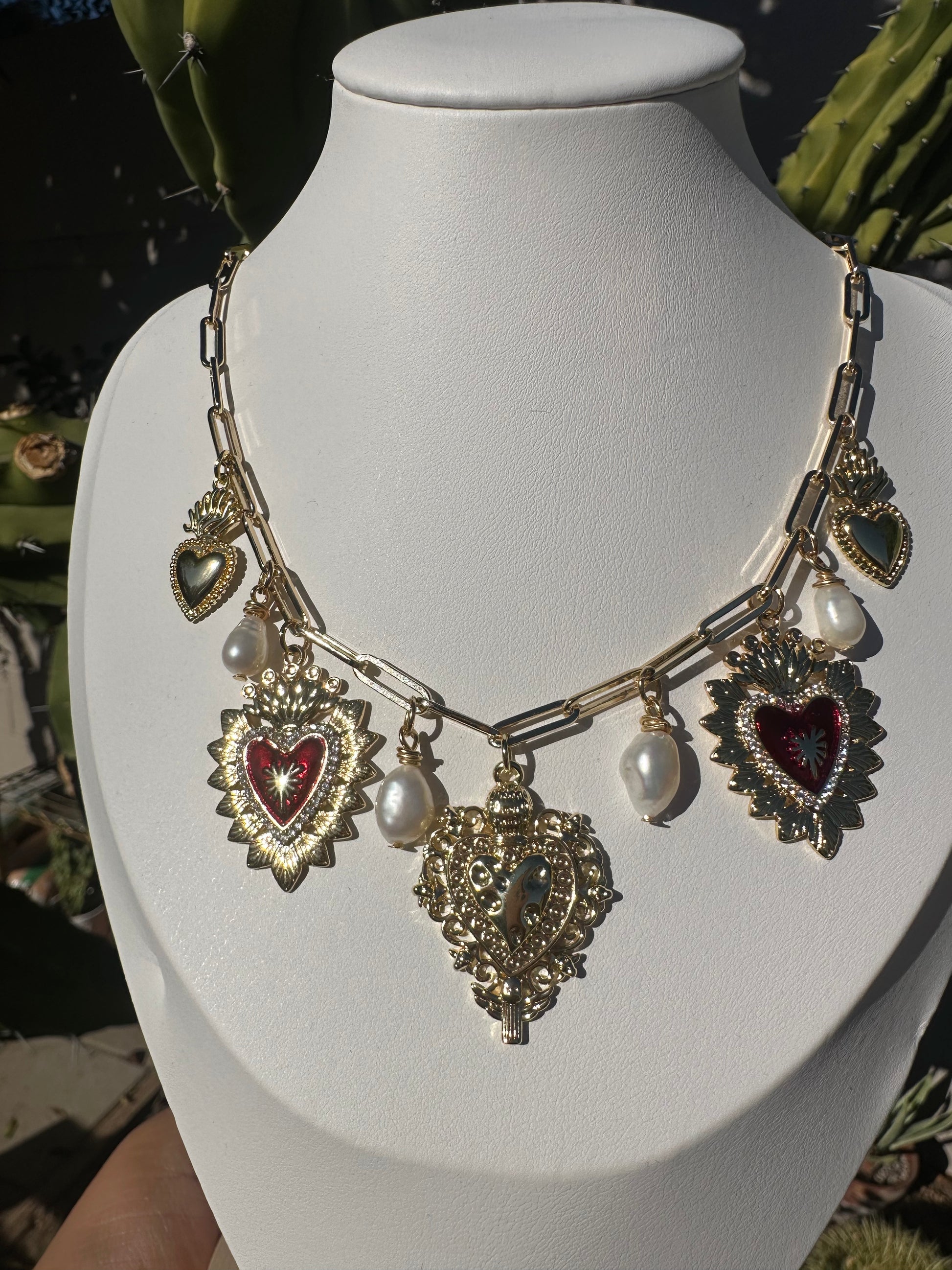 Sacred Heart charm and pearl necklace